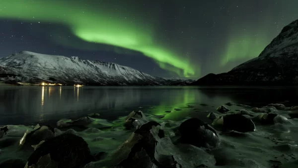 Northern Lights Holidays - frozen fjord and aurora borealis